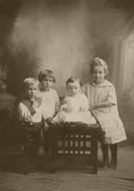 The family of Edgar Allen Engle and Mary Hoffman Engle, 1917:  John, Marion, Paul, Alma.  John Engle is the father of John E. Engle.